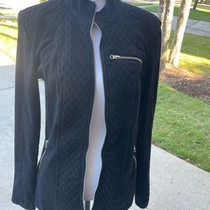 Liverpool black jacket with front zipper and zipper pockets.